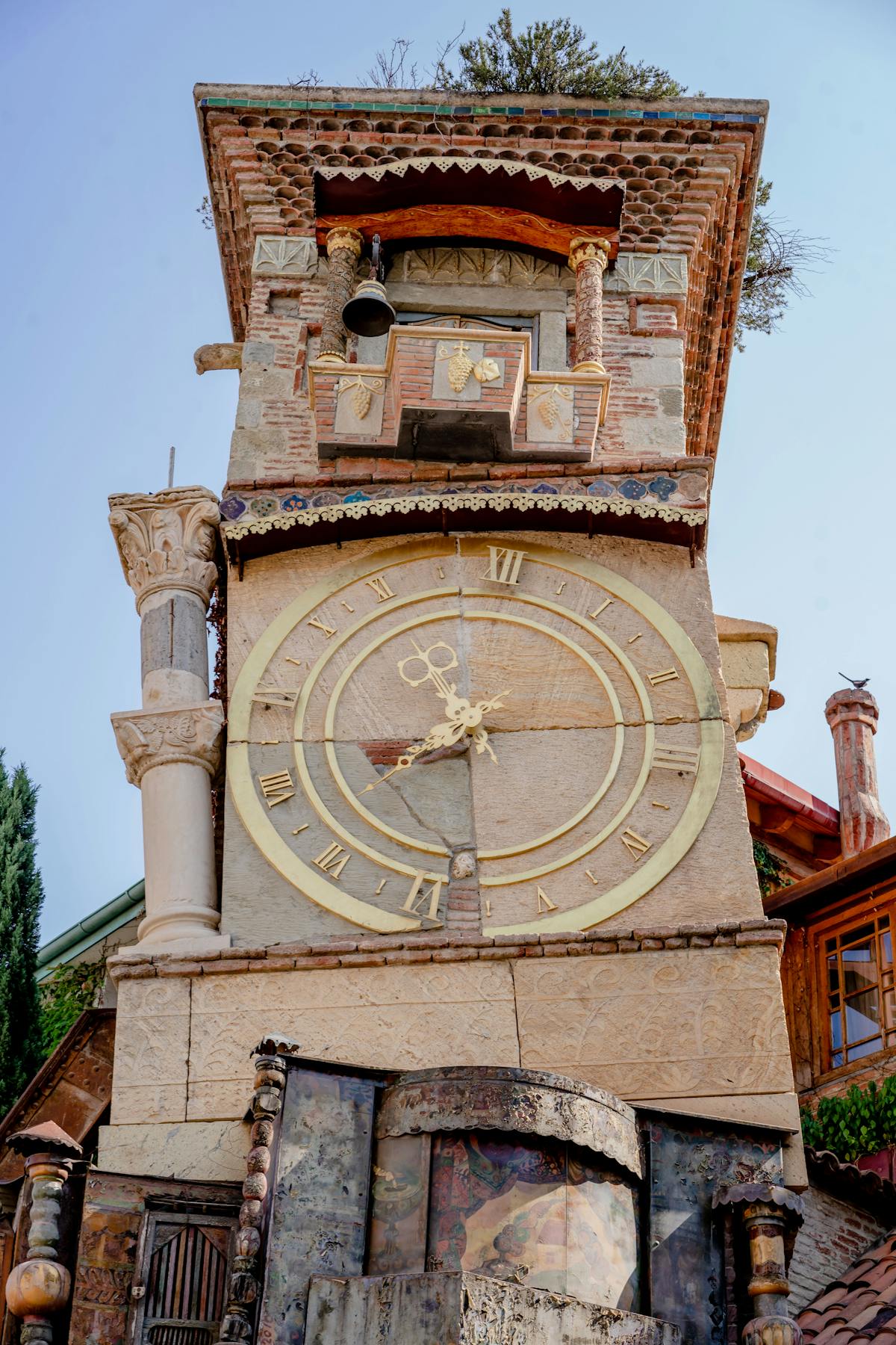 Gabriadze Clock Tower in Tbilisi Old Town, a whimsical leaning tower with hand-painted tiles